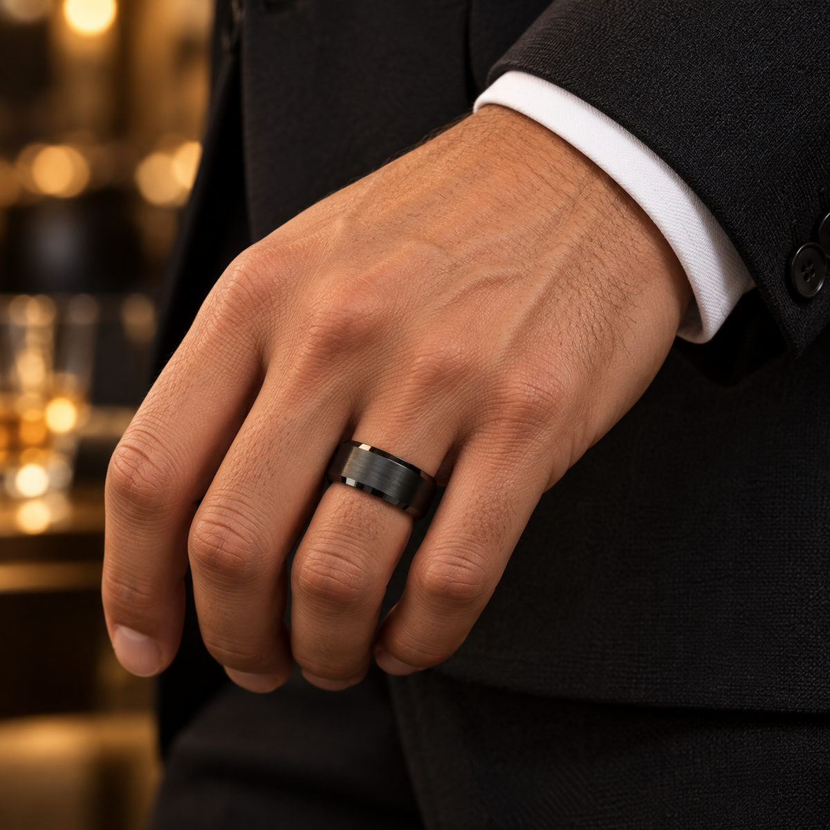 Lifestyle view of 10mm Black Tungsten Brushed Beveled Band worn on hand