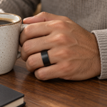 Lifestyle view of 12mm Black Tungsten Flat-Cut Brushed Band worn on hand