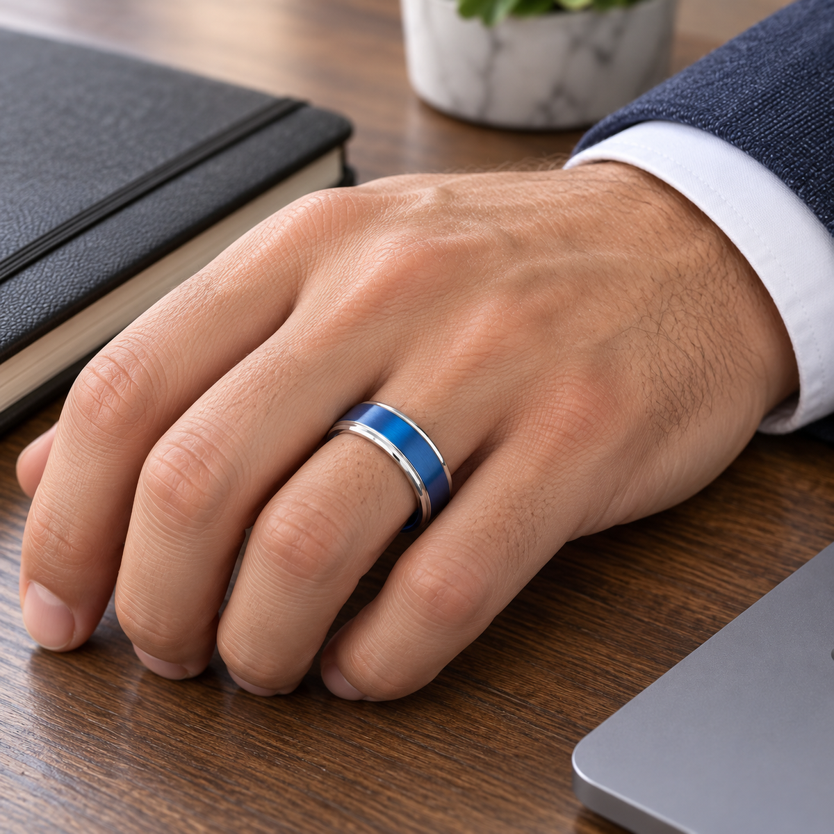 Lifestyle view of 6mm Blue Tungsten Brushed Stepped-Edge Band worn on hand