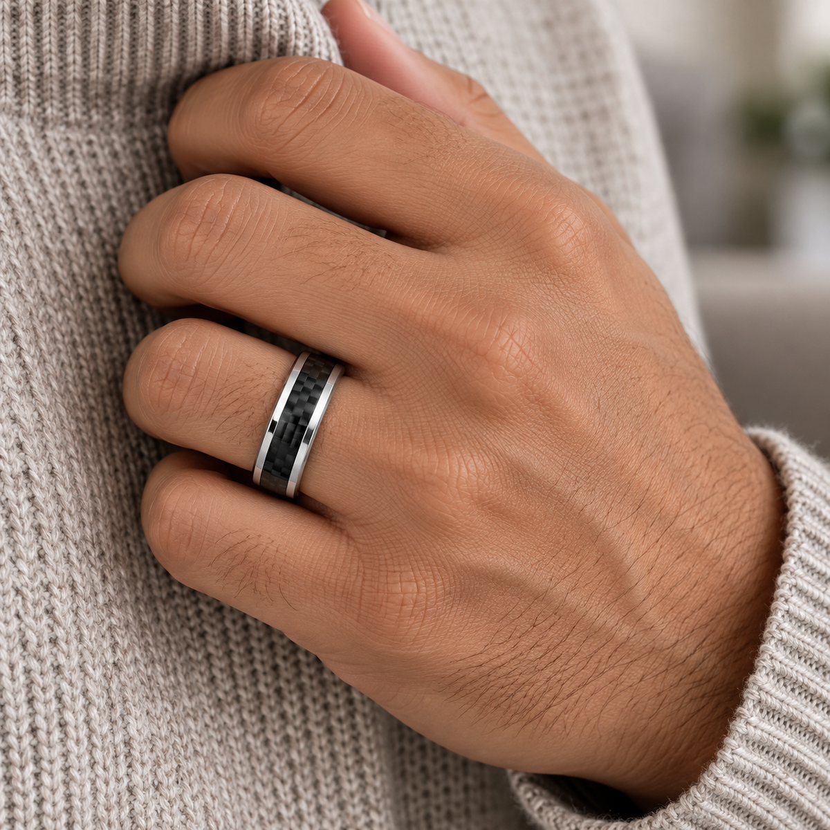Lifestyle view of 6mm Tungsten Band with Black Carbon Fiber Inlay worn on hand