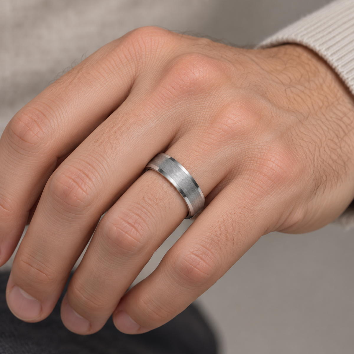 Lifestyle view of 6mm Tungsten Brushed Beveled-Edge Band worn on hand