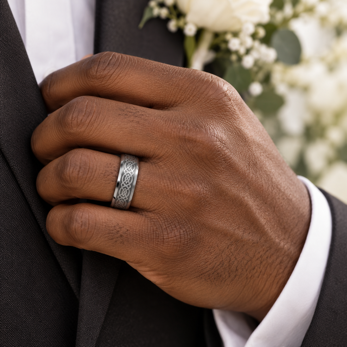 Lifestyle view of 6mm Tungsten Engraved Celtic Band worn on hand