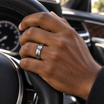 Lifestyle view of 6mm Tungsten High-Polish Band with Brushed Center Line worn on hand