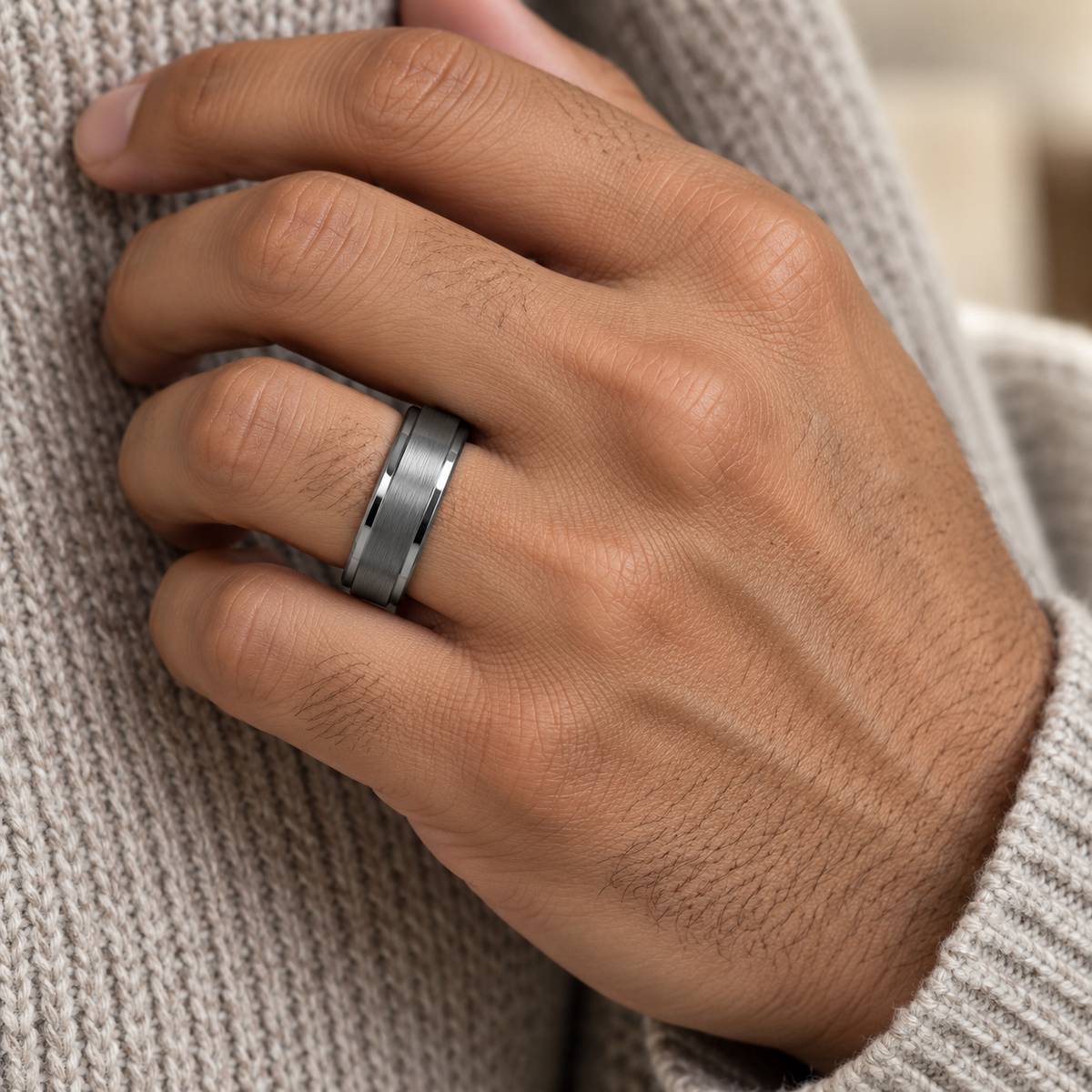 Lifestyle view of 7mm Tungsten Band with Brushed Center & Polished Steps worn on hand