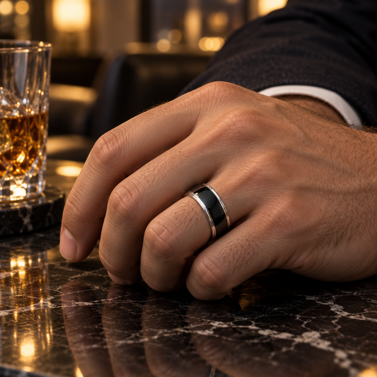 Lifestyle view of 8mm Black Tungsten Domed Band with White Stepped Edges worn on hand