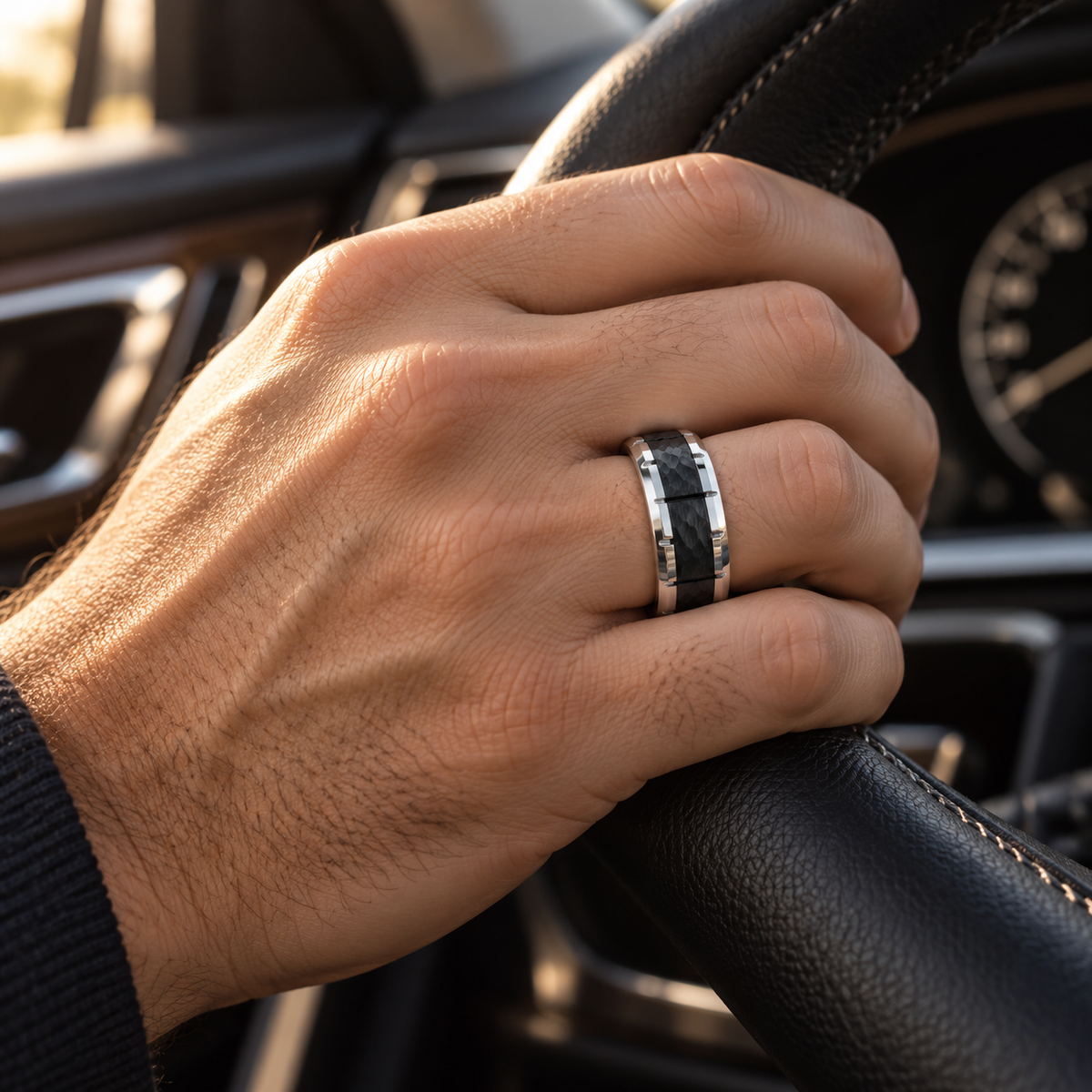 Lifestyle view of 8mm Black Tungsten Hammered Beveled Band with Notched Edges worn on hand