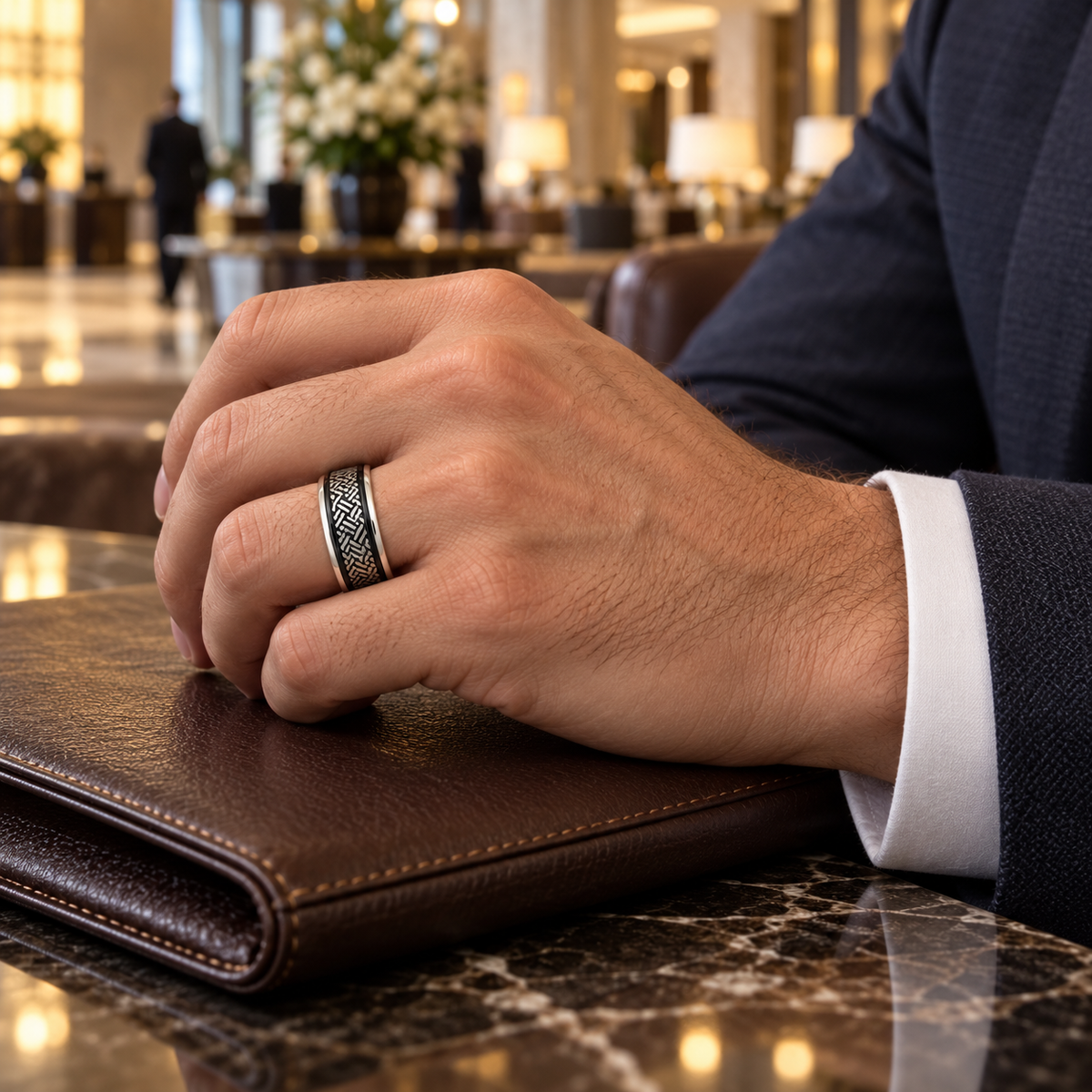 Lifestyle view of 8mm Black Tungsten Matte Weave Band worn on hand