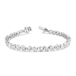 A multi-stone bezel set bracelet with 18k gold metal details.