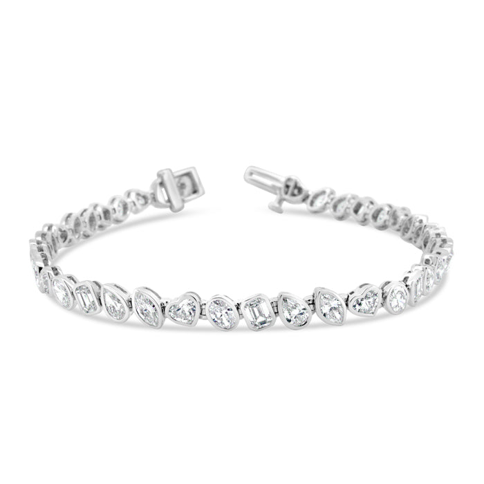 A multi-stone bezel set bracelet with 18k gold metal details.