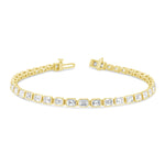 A gold-colored bracelet featuring a series of emerald-cut diamonds