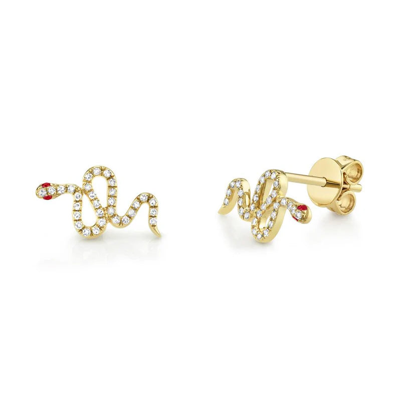 A pair of 14k gold metal stud earrings featuring a snake design with diamond accents.