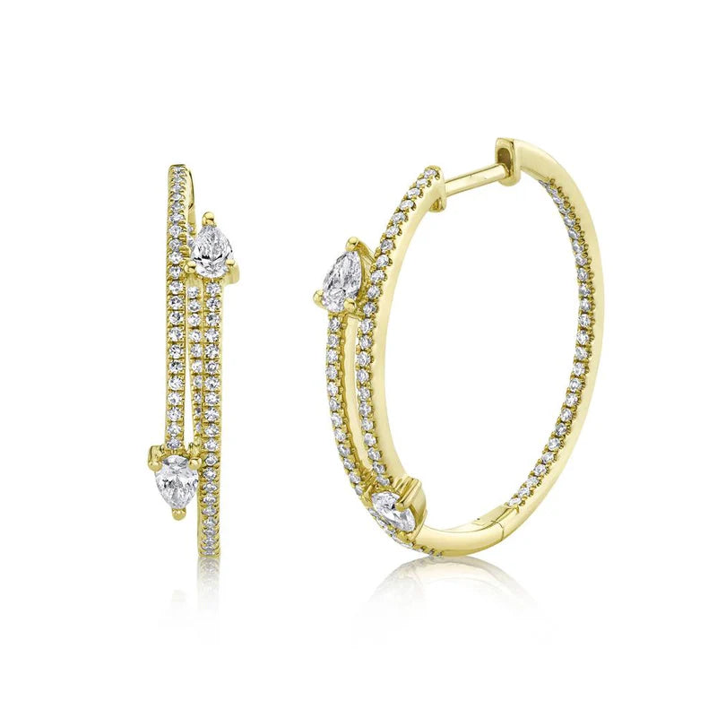 A pair of pear diamond hoop earrings with gold metal bands and multiple pearl accents