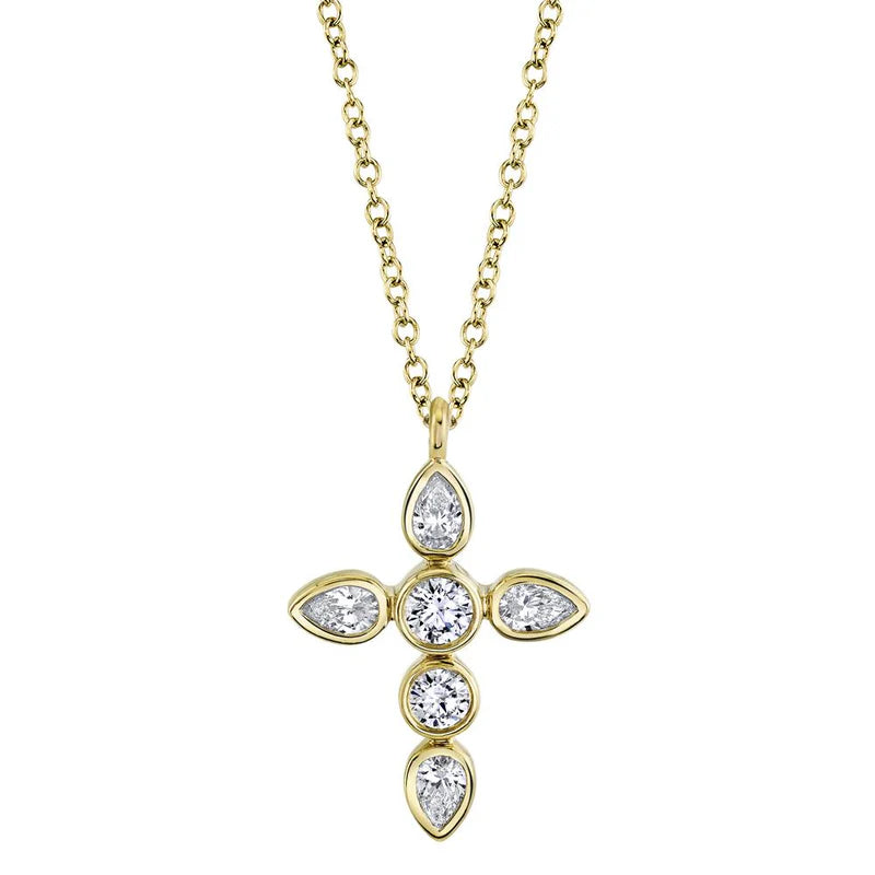 A gold-colored necklace featuring a bezel-style pendant with a central pear and round diamonds, with the chain being 18 inches long.