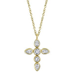 A gold-colored necklace featuring a bezel-style pendant with a central pear and round diamonds, with the chain being 18 inches long.
