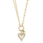 A 14K gold necklace with a mother of pearl heart-shaped clip and a small diamond detail.