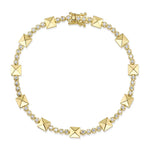 A gold-colored bracelet featuring a series of diamond-encrusted geometric pyramids.