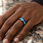 8mm Black Tungsten Band with Blue Meteorite Arrow Inlay worn on hand lifestyle view — TR969