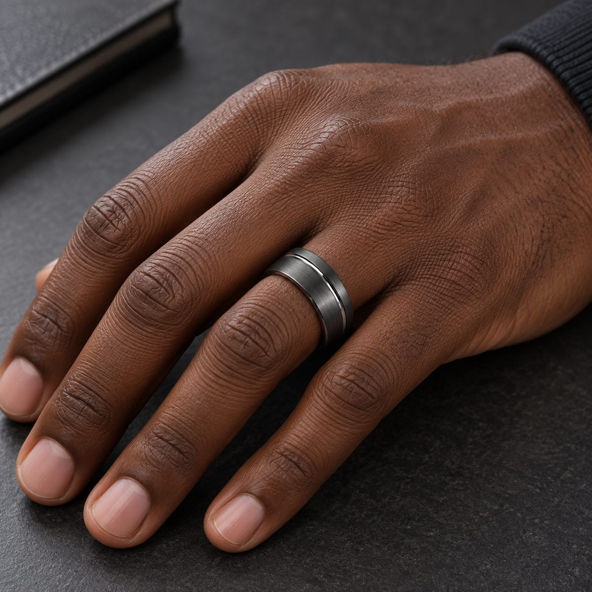 8mm Gunmetal Tungsten Brushed Beveled-Edge Band worn on hand lifestyle view — TR976