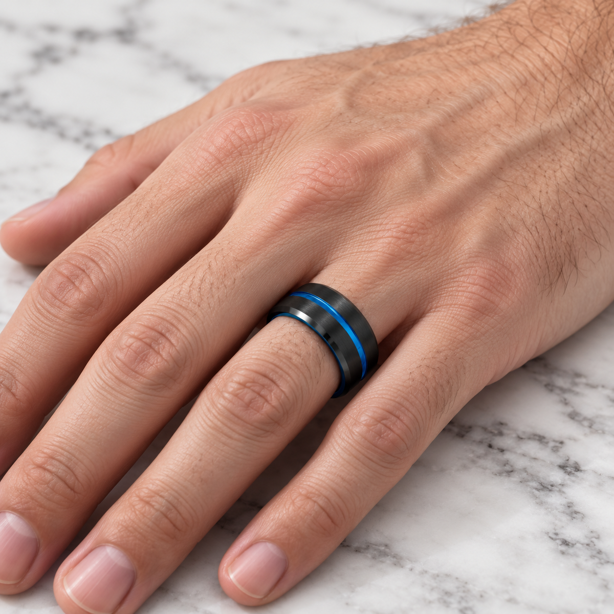 8mm Black & Blue Tungsten Brushed Groove Band worn on hand lifestyle view — TR986