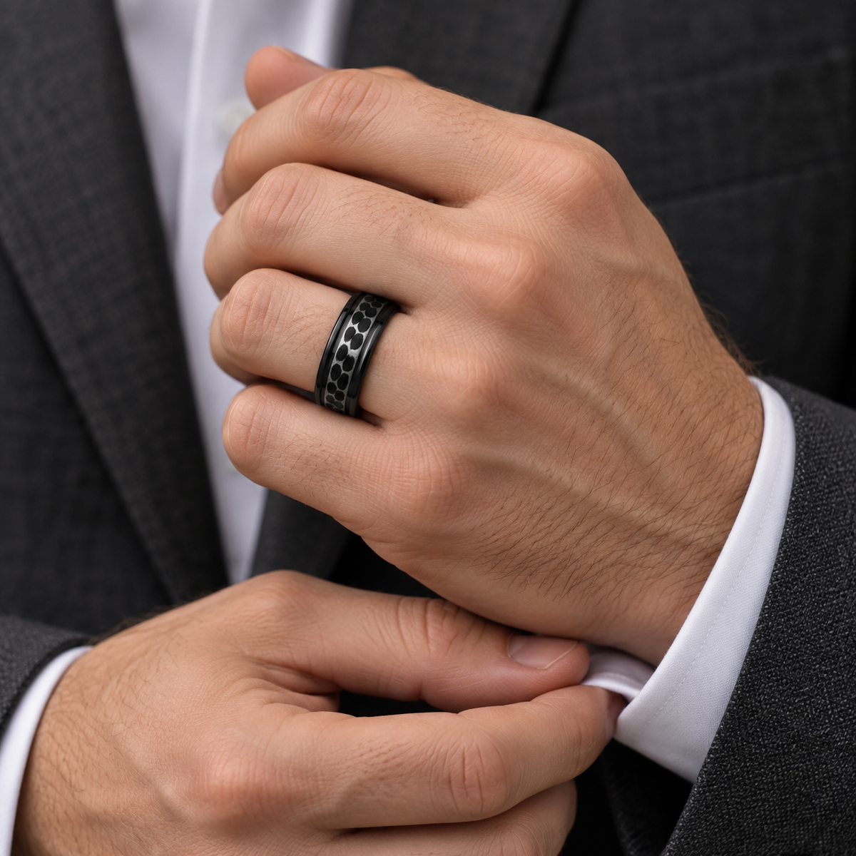 8mm Black Tungsten Dimpled Double-Groove Band worn on hand lifestyle view — TR991
